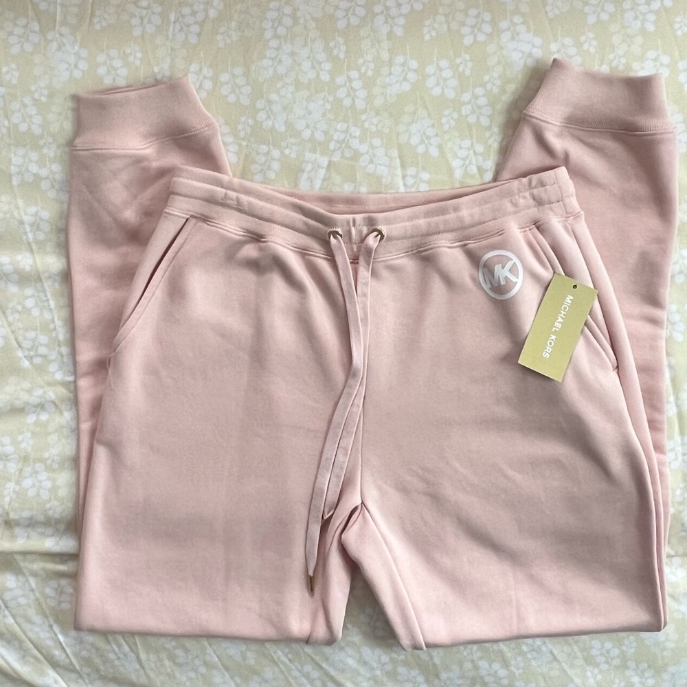 NWT Michael Kors solid pink joggers w/ white MK logo. Small and X-Large sizes